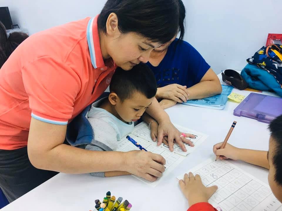 Children taking part in a creative classroom activity