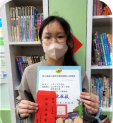 Student presenting completed classroom work